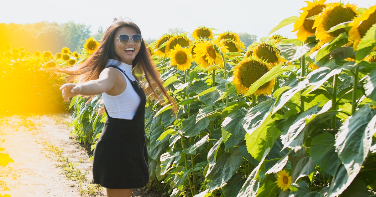 girl in sunflower field